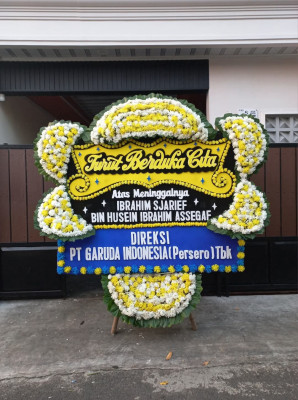 Papan Bunga Duka di Karombasan Utara