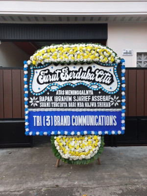 Papan Bunga Duka di Karombasan Utara